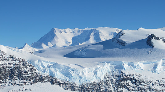 snowy mountain during daytime thumbnail