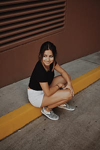 woman sitting on yellow bumper thumbnail