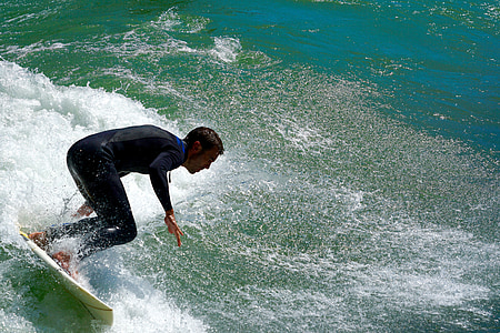 man riding surfboard thumbnail