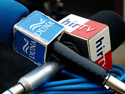 two black and gray microphones close-up photography thumbnail