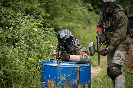 two person using paintball markers thumbnail