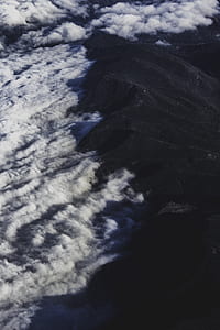 bird's eye photo of mountain and sea cloud thumbnail