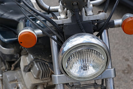 gray and black standard motorcycle headlight turned off thumbnail