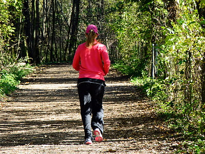 woman running in woods thumbnail