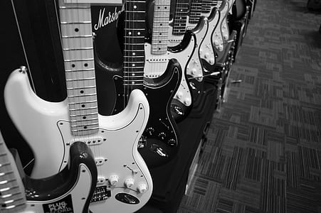 grayscale photo of guitars thumbnail