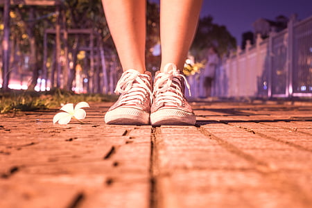 person wearing pair of brown sneakers thumbnail