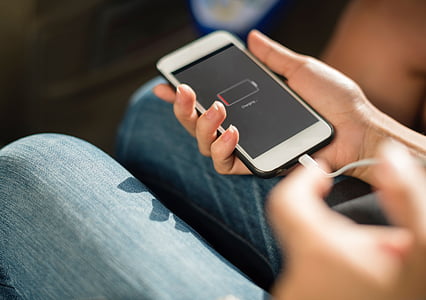 person holding iPod touch displaying charging sign thumbnail
