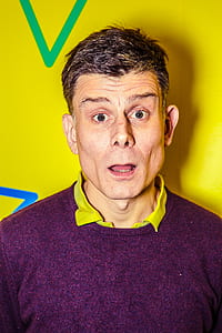 portrait photography of man in purple sweater thumbnail