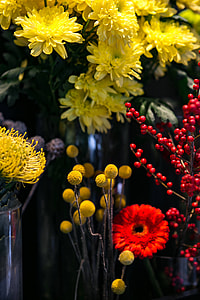 Red rowan with a colourful arrangement of flowers thumbnail