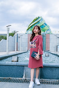 Woman in Front of Body of Water thumbnail