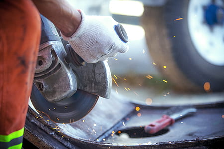 person holding right-angle circular saw thumbnail