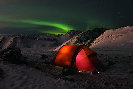 green tent under Northern lights thumbnail