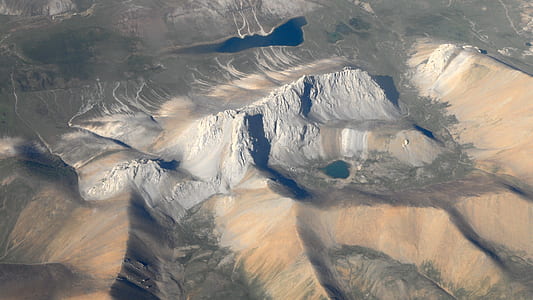 aerial photo of landmass during daytime thumbnail