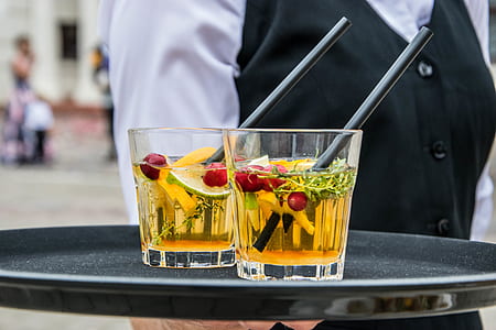 2 Whisky Glasses Filled With Beverage on Black Tray thumbnail