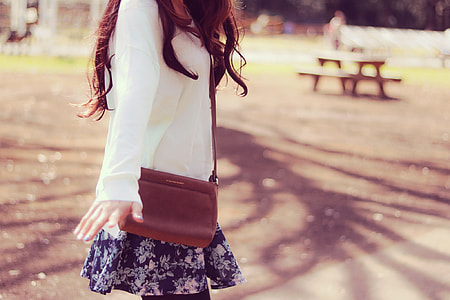 woman wearing white long-sleeved shirt thumbnail