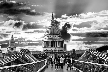 grayscale photo of people near on cathedral thumbnail