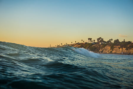 selective focus photography of sea waves thumbnail