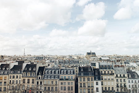 white and black concrete buildings during daytime thumbnail