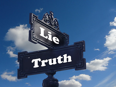 black and white lie and truth signage during daytime thumbnail