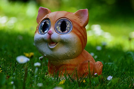 brown cat figurine thumbnail