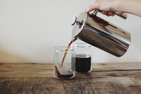 gray stainless steel pitcher and clear drinking glass thumbnail