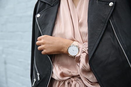 selective focus photo of a person's wrist with round silver-colored watch thumbnail