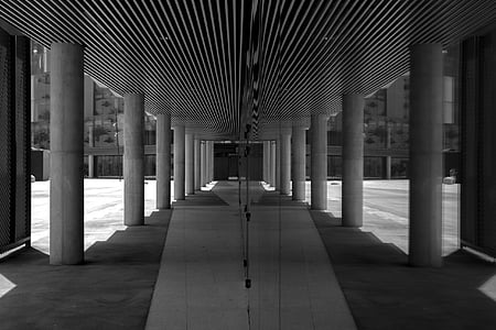 grayscale photography of building aisle thumbnail