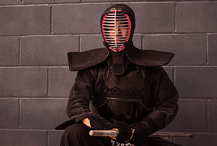 person wearing fencing armor thumbnail