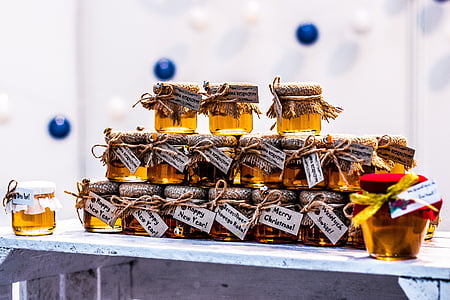 clear glass jar stack on beige table thumbnail