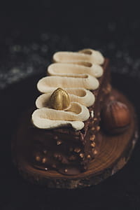 selective focus photography of chocolate bar with nuts thumbnail