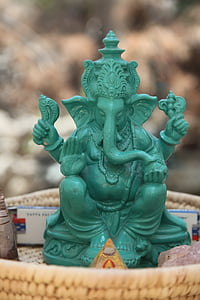 selective focus photography of Ganesha figurine thumbnail