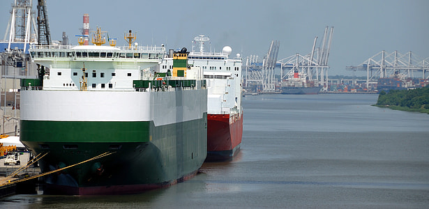 ships on body of water beside dock during daytime photo thumbnail