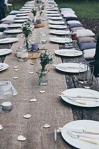 piled plate on wooden table thumbnail