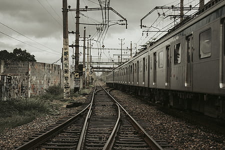gray train on railroad thumbnail
