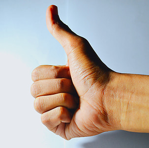person's right hand showing okay sign thumbnail