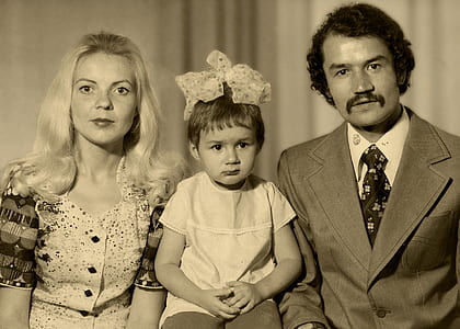 grayscale photo of man, woman, and girl thumbnail