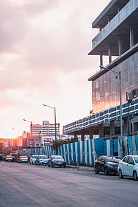 Cars Parked In Front Of The Building thumbnail