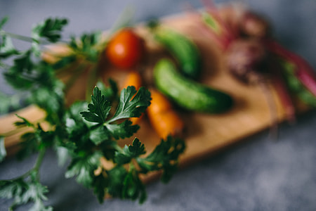 Parslel, cucumbers, green peas, and other greenery thumbnail