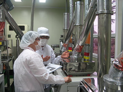 two man standing in front of machine thumbnail
