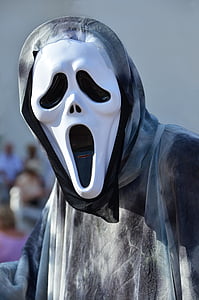 person wearing Ghostface mask thumbnail