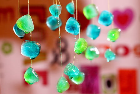 shallow focus photography of blue and green gemstone hanging decors thumbnail