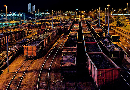 aerial photography of coals on train trailers thumbnail
