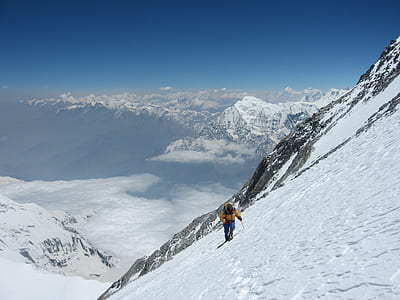 person walking on ice mountain thumbnail