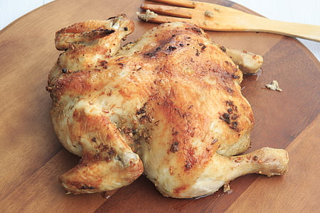 grilled chicken on brown wooden tray thumbnail
