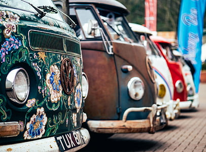 selective focus photography of Volkswagen Transporter parking thumbnail