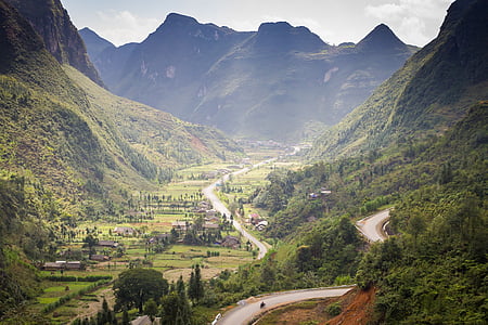 green mountains with house thumbnail