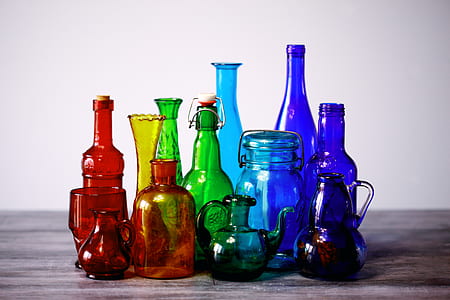 blue, orange, and red glass bottles thumbnail
