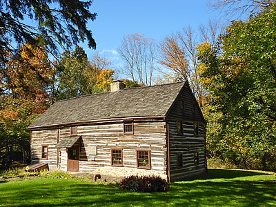 beige wooden house during daytimie thumbnail