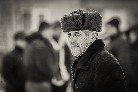 grayscale photo of man wearing snow hat thumbnail