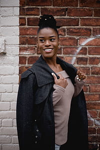 woman wearing black coat thumbnail